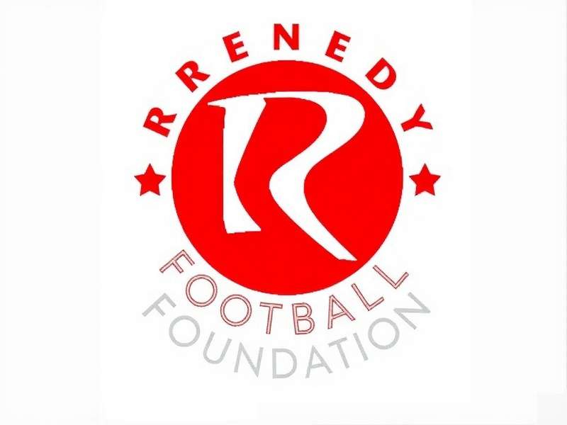 Renedy Football Foundation team coaching children